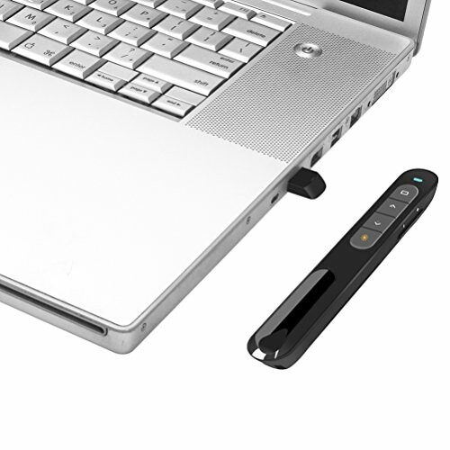 Laptop with a USB presentation remote next to it